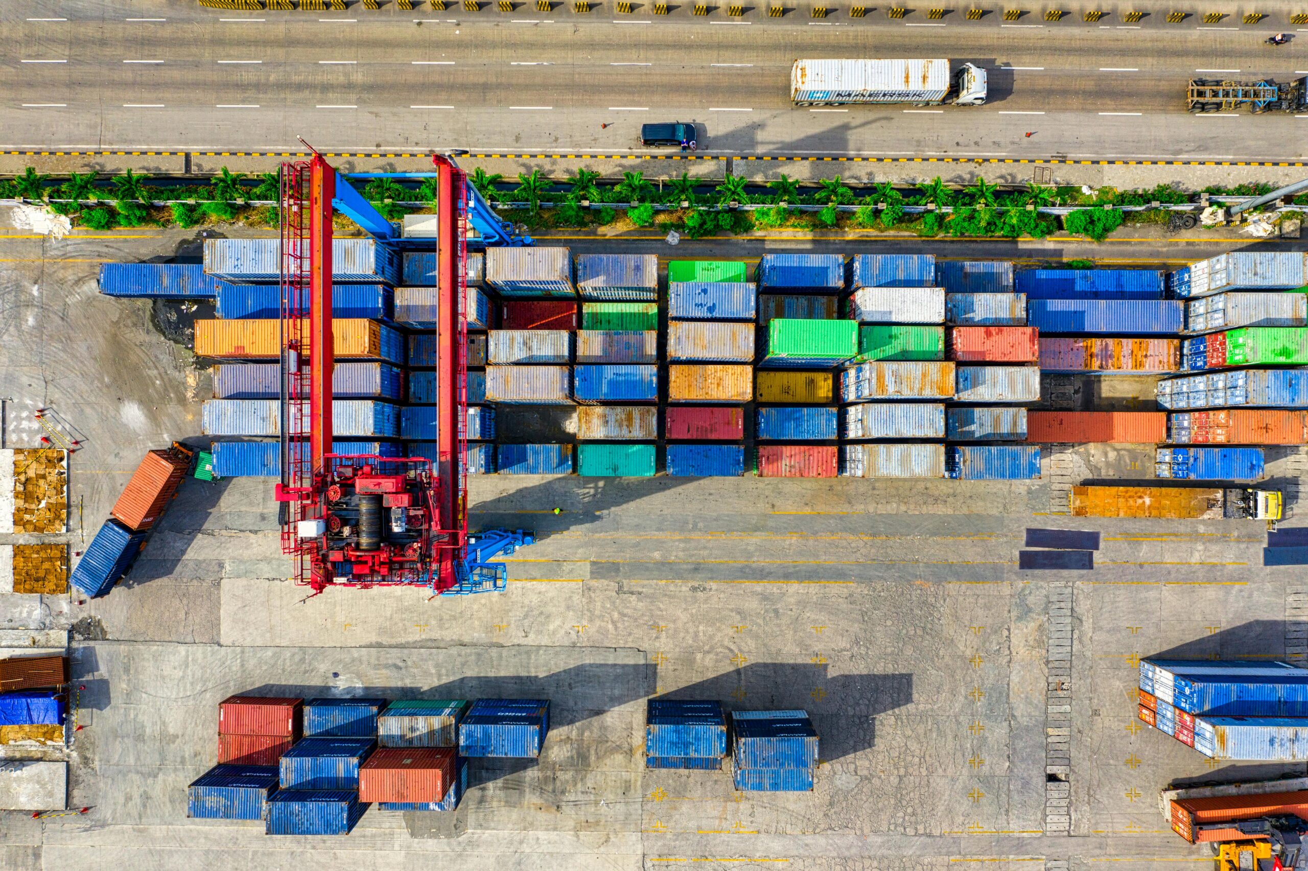 Home Colorful cargo containers organized at a shipping yard in North Jakarta, Indonesia.